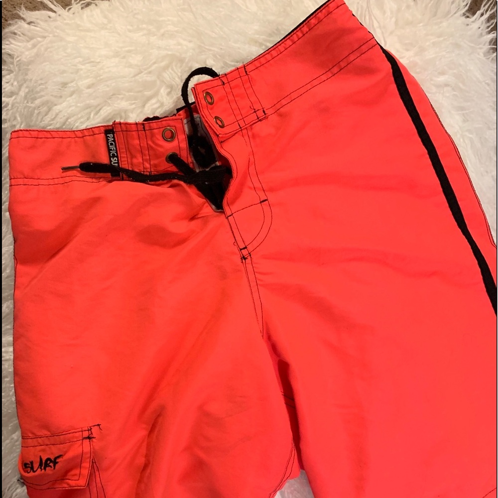 Men’s large neon coral colored swimsuit.